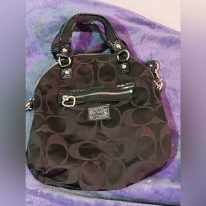 Medium sized scoop shaped— Coach bag
